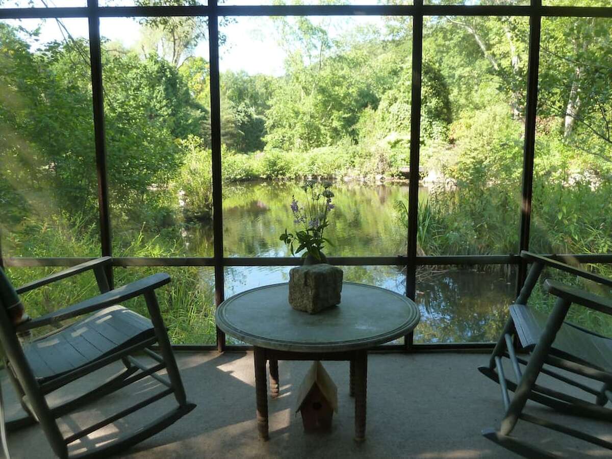 River houseboat, Newtown $99 a night Description: Our rustic River Houseboat is on the edge of the Pootatuck River on our lower pond. The Houseboat has a comfy queen bed and a screened porch complete with two antique rocking chairs. The River Houseboat is often preferred because it is located close to the main Stone Barn and parking lot. The Stone Barn is open 24 hours and has a hot shower, toilet, and common room with internet and books. View full listing on Airbnb
