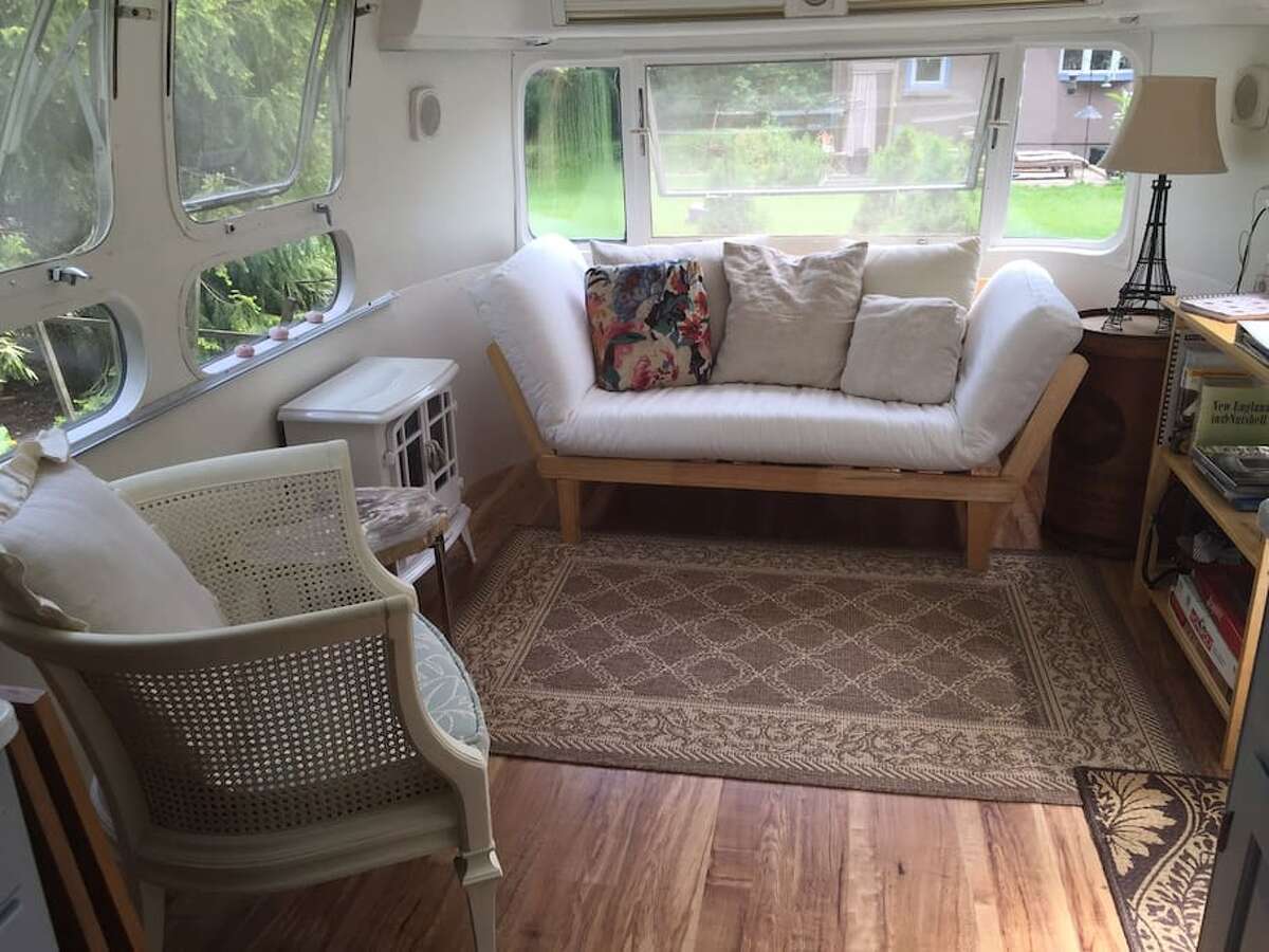 Airstream trailer, Stonington $125 a night Description: Situated in my private backyard off a country road, "Ms Amelia" is a 1975 Airstream Trailer. She is a graceful dame who has been thoroughly updated and refurbished. At 30 feet long, there is ample space. She has a private bedroom with a queen size bed on a raised platform. View full listing on Airbnb