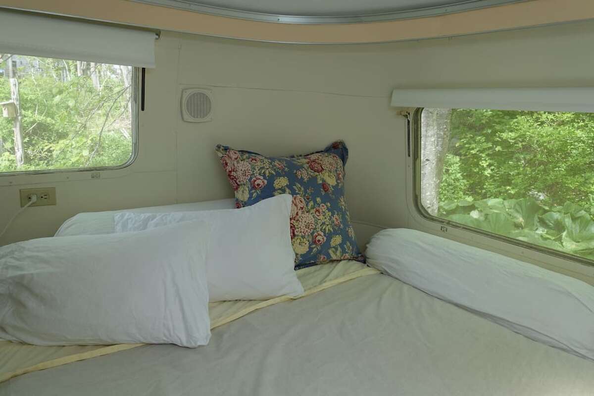 Airstream trailer, Stonington $125 a night Description: Situated in my private backyard off a country road, "Ms Amelia" is a 1975 Airstream Trailer. She is a graceful dame who has been thoroughly updated and refurbished. At 30 feet long, there is ample space. She has a private bedroom with a queen size bed on a raised platform. View full listing on Airbnb