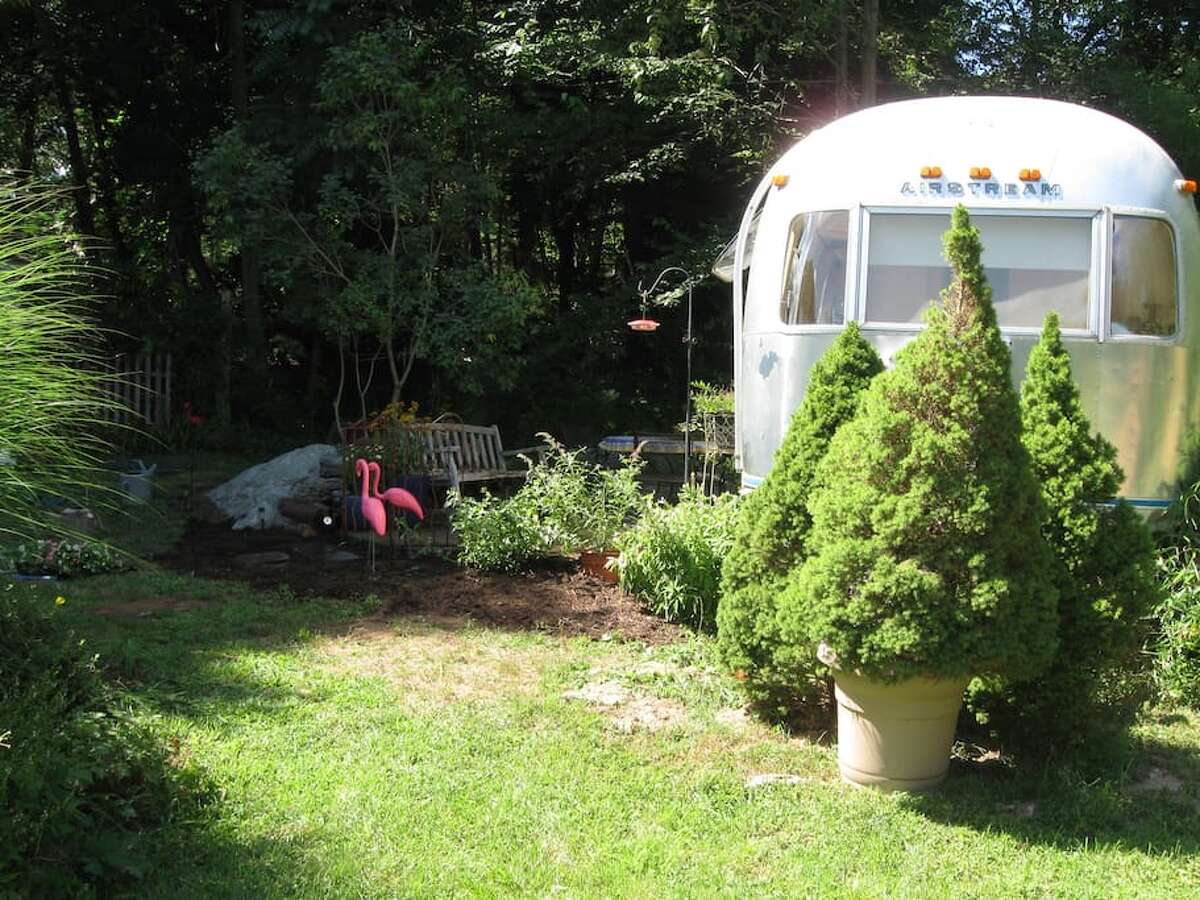 Airstream trailer, Stonington $125 a night Description: Situated in my private backyard off a country road, "Ms Amelia" is a 1975 Airstream Trailer. She is a graceful dame who has been thoroughly updated and refurbished. At 30 feet long, there is ample space. She has a private bedroom with a queen size bed on a raised platform. View full listing on Airbnb