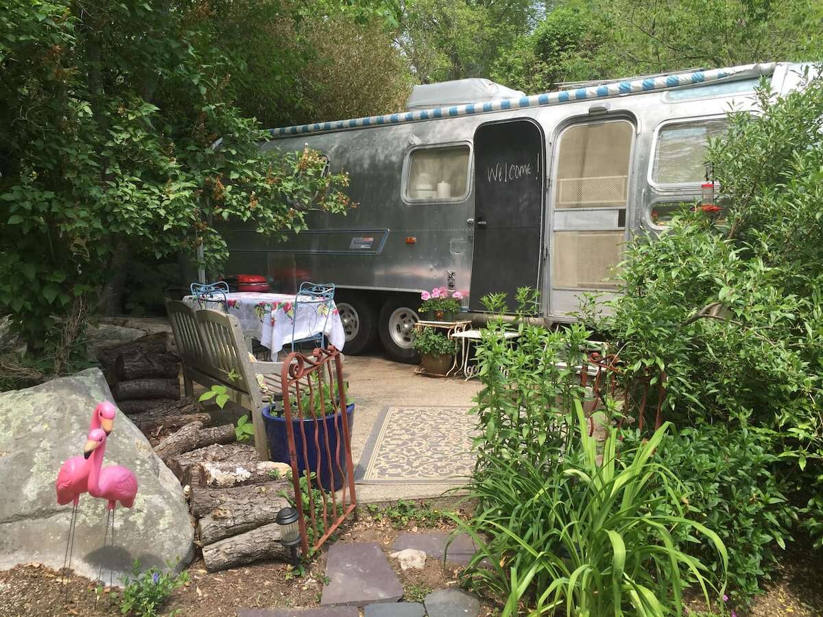 Airstream trailer, Stonington $125 a night Description: Situated in my private backyard off a country road, "Ms Amelia" is a 1975 Airstream Trailer. She is a graceful dame who has been thoroughly updated and refurbished. At 30 feet long, there is ample space. She has a private bedroom with a queen size bed on a raised platform. View full listing on Airbnb