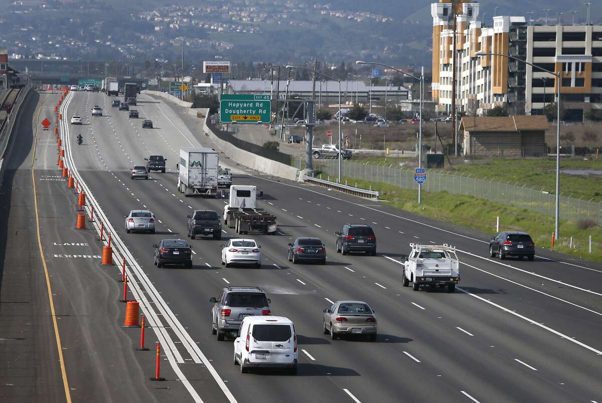 Commuters roll past express lanes on westbound Interstate 580 in Pleasanton, Calif. on Tuesday, Feb. 9, 2016. The new lanes which may cost up to $13 for solo drivers to travel for the entire 14-mile corridor, is scheduled to open before the end of the month.