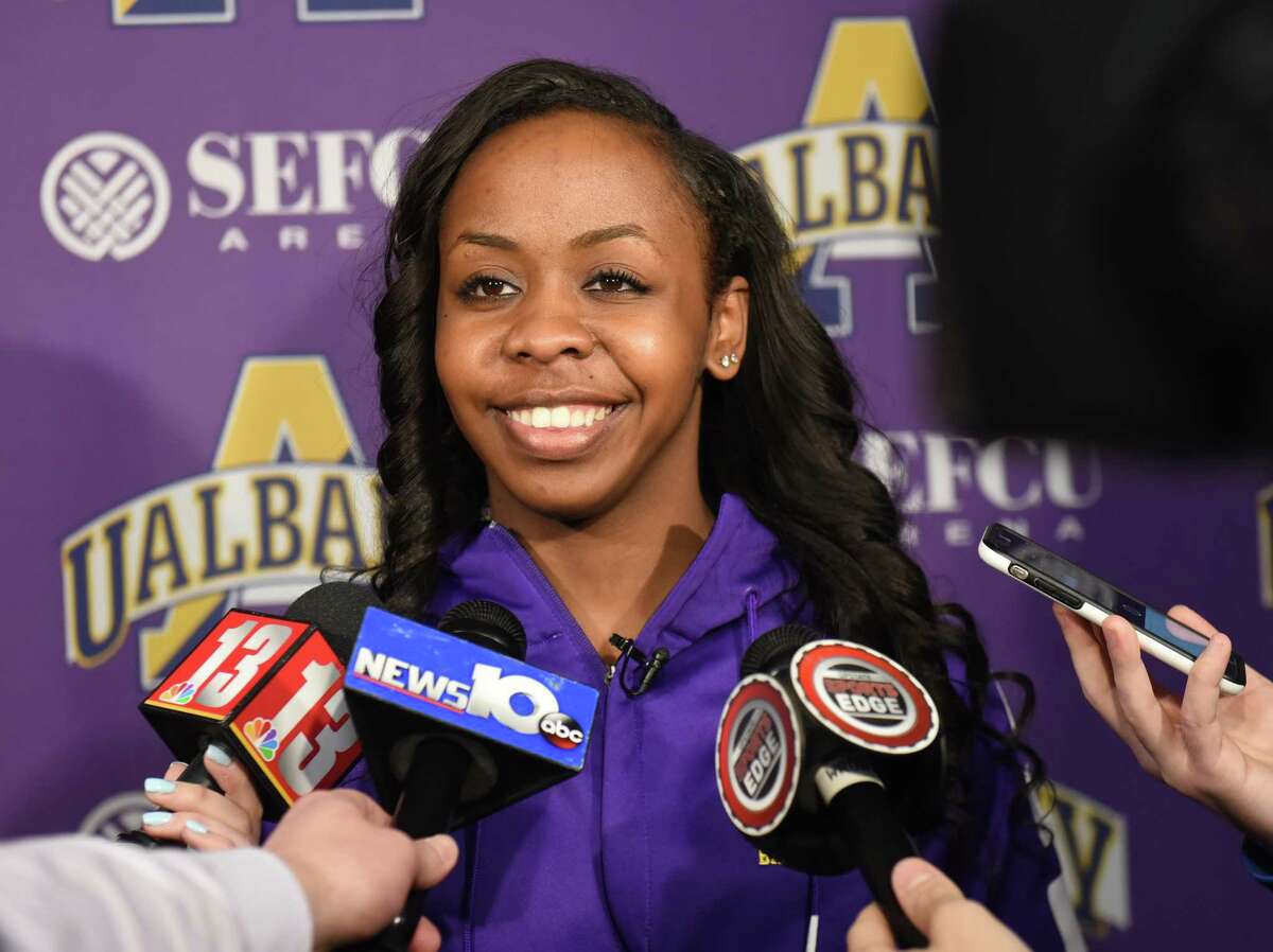 University at Albany women's basketball player Imani Tate talks to the press after finding out her team will be competing against Connecticut in the NCAA Tournament during a viewing party in the Hall of Fame room at SEFCU Arena on Monday, March 13, 2017 in Albany, N.Y. UConn as has won 107 consecutive games and is the No. 1 seed. (Lori Van Buren / Times Union)