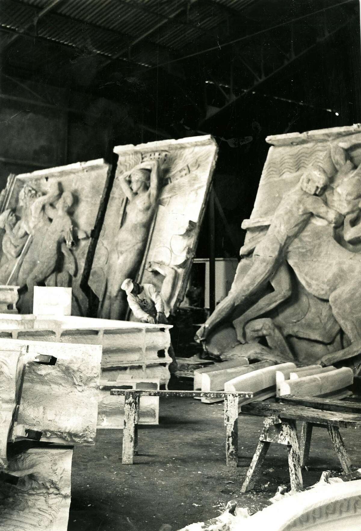 San Francisco Palace of Fine Arts museum under restoration. The bas reliefs shown in the photo, are original. Joe Bosch was a plaster worker seen making reproductions. August 3, 1965