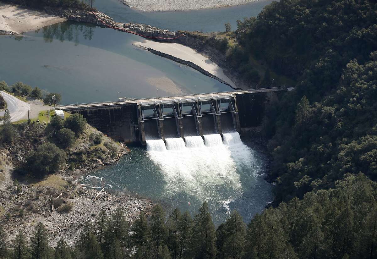 Water is released through the Ralston Afterbay dam which is a part of the Middle Fork American River watershed and managed by the Placer County Water Agency near Foresthill, Calif. on Wednesday, March 15, 2017. Energy generated from hydroelectric plants is expected to rise dramatically after a season of heavy rain and a deep snowpack.