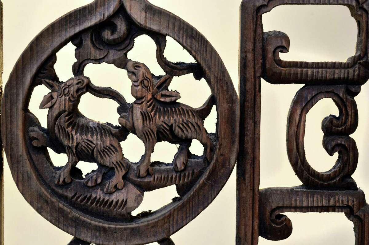 Detail of one of the ancient Chinese carved wood panels from the year 300 A.D. that frame the entrance foyer at the home on Darbrook Rd in Westport Conn. on Thursday March 2, 2017.