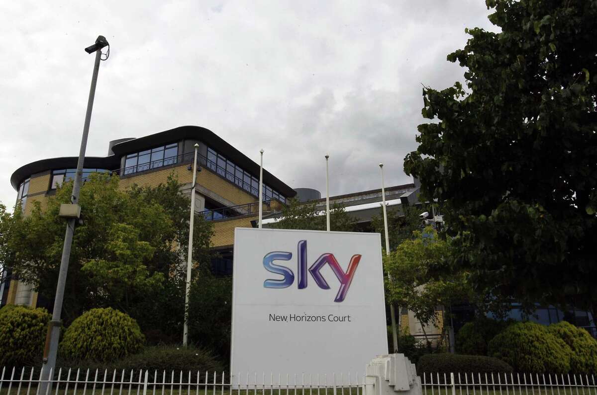 File photo of a Sky sign at the BSkyB offices in Isleworth in London. The takeover for the 61 percent of Sky that 21st Century Fox does not already own was agreed on in December and is the second such effort to combine the two companies since 2011. The latest attempt quickly raised a wave of criticism in Britain, where Murdoch already holds several media interests.