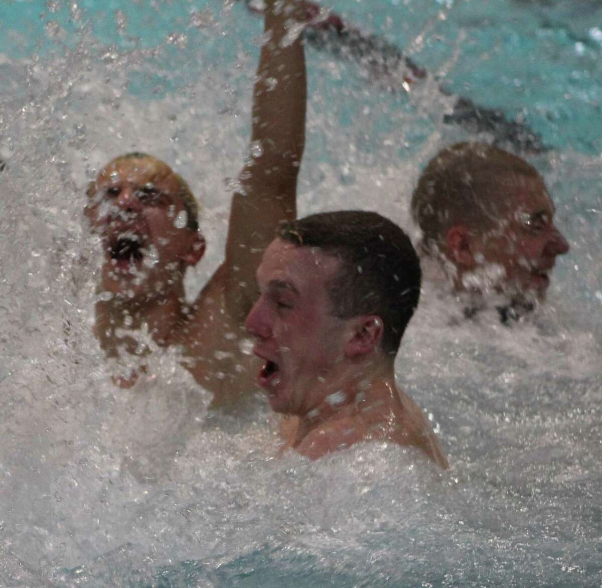 The Brookfield High School boys swimming and diving team celebrates its victory at the Class S state championships at Wesleyan University in Middletown March 16, 2017.