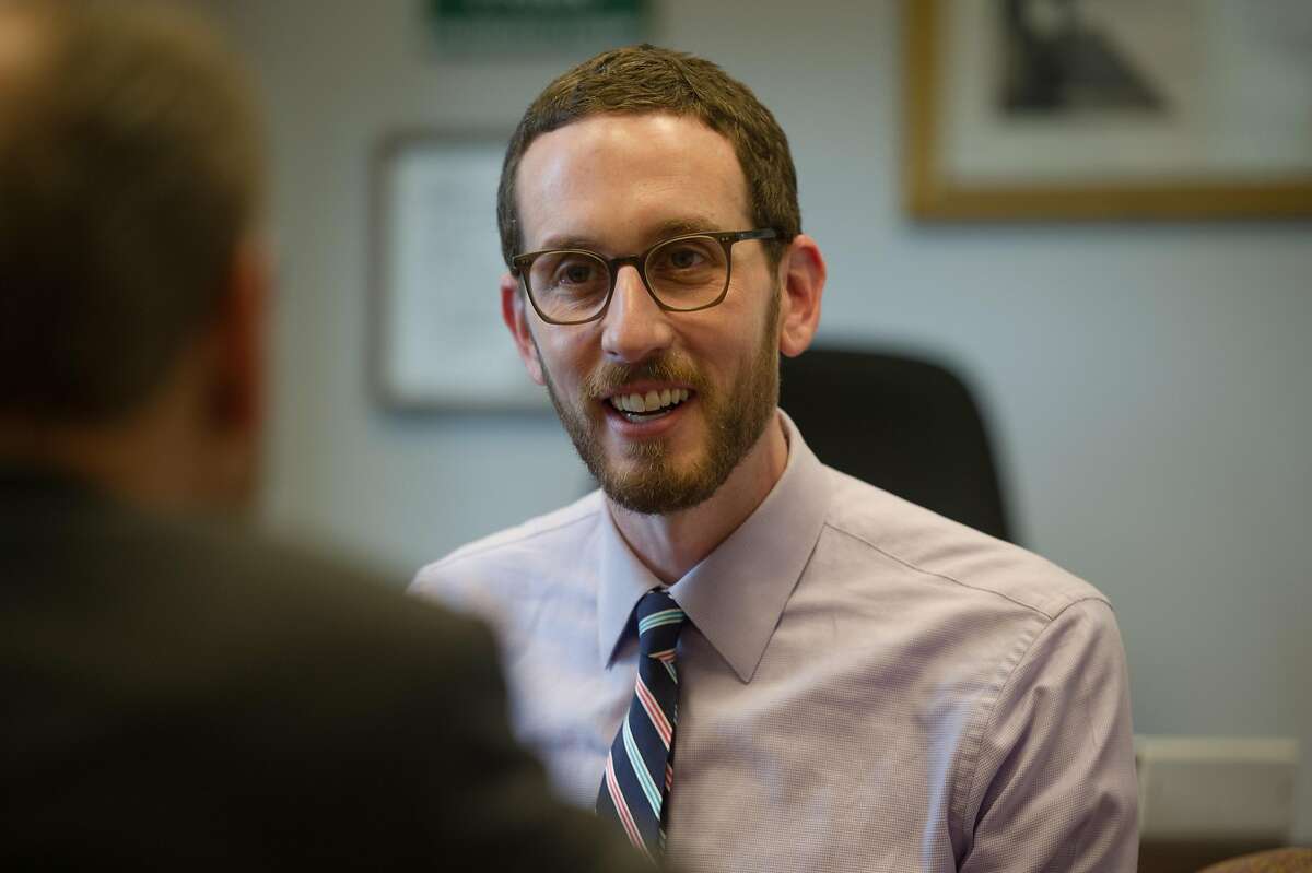Sen. Scott Wiener, D-San Francisco, talks with Sen. Jerry Hill, D-San Mateo, in his office in the state Capitol in Sacramento, Calif. on Thursday, March 16, 2017.