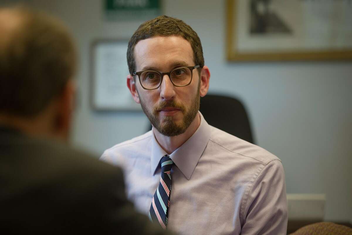 Sen. Scott Wiener, D-San Francisco, talks with Sen. Jerry Hill, D-San Mateo, in his office in the state Capitol in Sacramento, Calif. on Thursday, March 16, 2017.