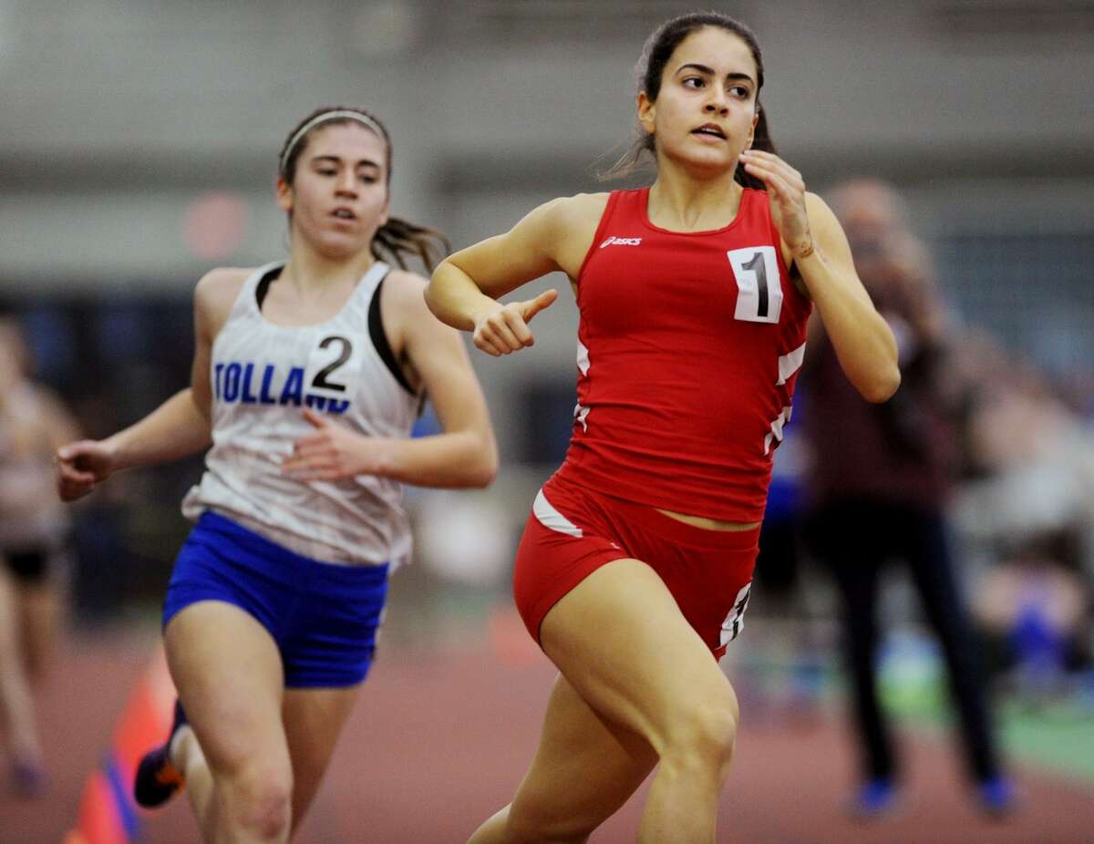 Greenwich’s Emily Phillippides, right, was part of the Cardinals’ 4x800-meter relay team that placed fourth at the New Balance Indoor Nationals. She also earned individual All-American honors with a sixth-place finish in the 800.