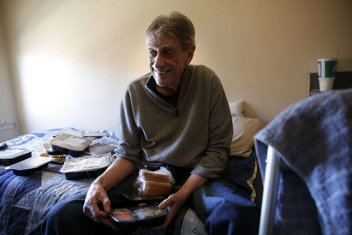 Tenderloin resident David Drees, 70 after receiving a delivery of his weekend food supplies, sorts through his items. Drees depends on Meals on Wheels for about ninety percent of his meals, as seen on Fri. March 17, 2017., in San Francisco, Ca. Meals on Wheels has been targeted to lose its funding under the Trump budget.