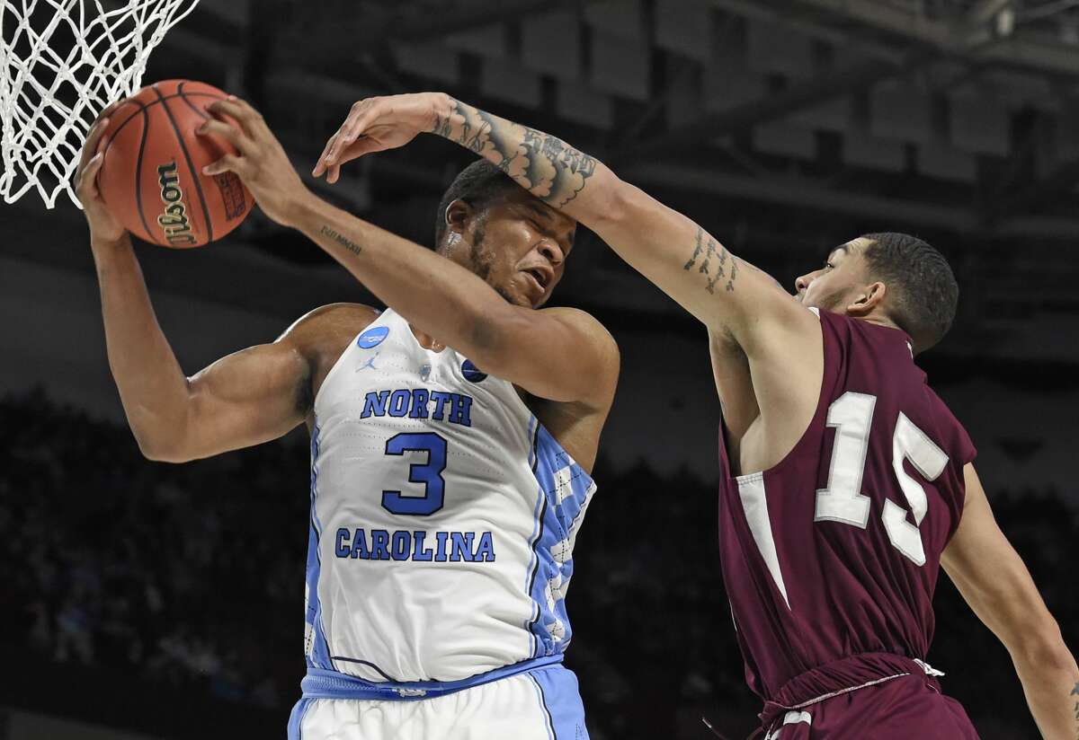 North Carolina's Kennedy Meeks (3) grabs a rebound against Texas Southern's Stephan Bennett (15) during the second half in a first-round game of the NCAA men's college basketball tournament in Greenville, S.C., Friday, March 17, 2017. (AP Photo/Rainier Ehrhardt)