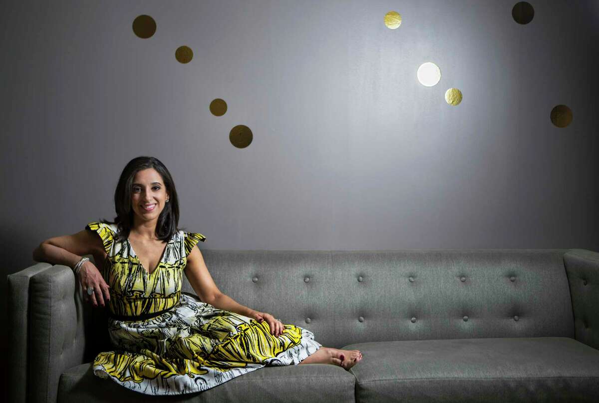 Rania Mankarious, executive director of Crime Stoppers, in a Miles David dress by Houston designer David Peck.