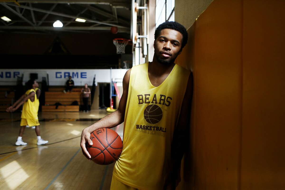 Niamey Harris, a senior at Mission High School, poses for a portrait before practice in his school gym on Friday, March 17, 2017, in San Francisco, Calif.