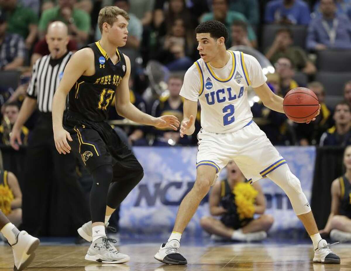 UCLA’s Lonzo Ball squares up against Kent State’s Jon Fleming in Sacramento.