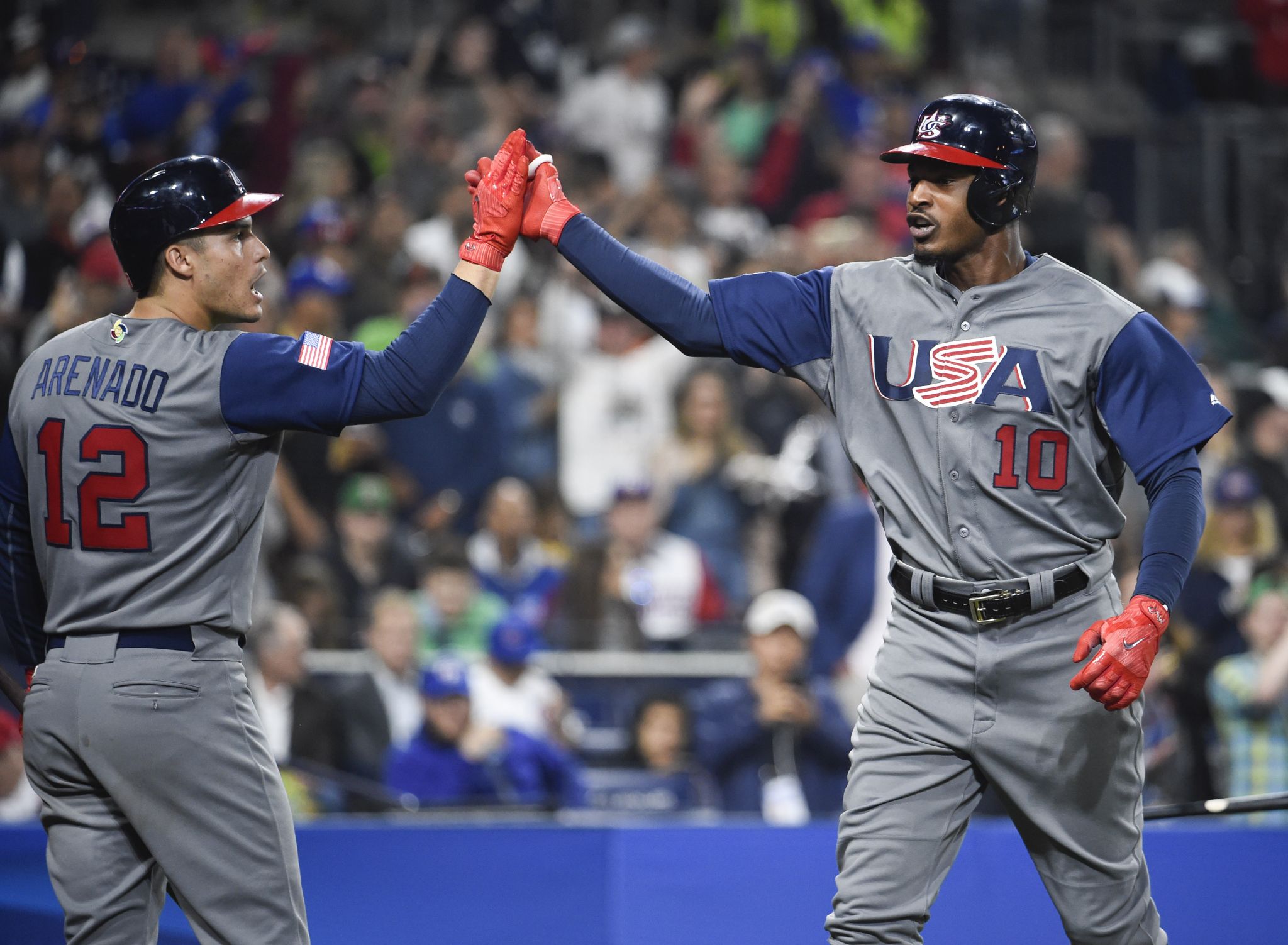SAN DIEGO, CA - MARCH 17: Puerto Rico Second baseman Javier Baez gets high  fives after their 6-5 win over the USA in World Baseball Classic second  round Pool F game against