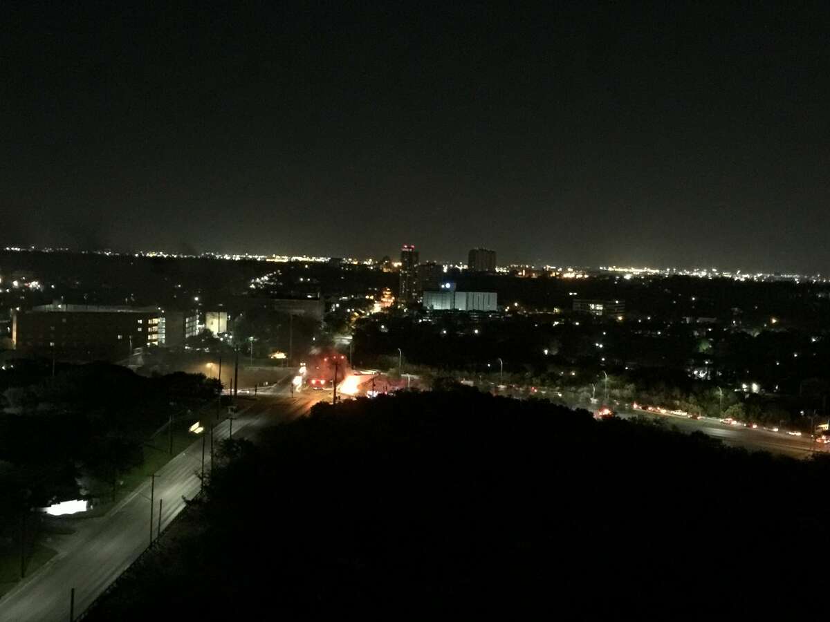 A driver was killed early Saturday, March 18, 2017, after their car slammed into a wall and erupted in flames on Hwy. 281 near Hildebrand. A reader-submitted photo shows a view of the crash from Olmos Tower.