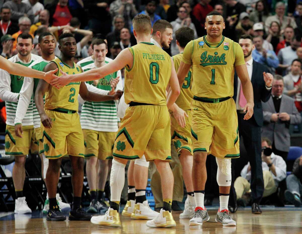 Notre Dame celebrates a 60-58 victory over Princeton during the first-round men's college basketball game in the NCAA Tournament, Thursday, March 16, 2017, in Buffalo, N.Y. (AP Photo/Jeffrey T. Barnes)
