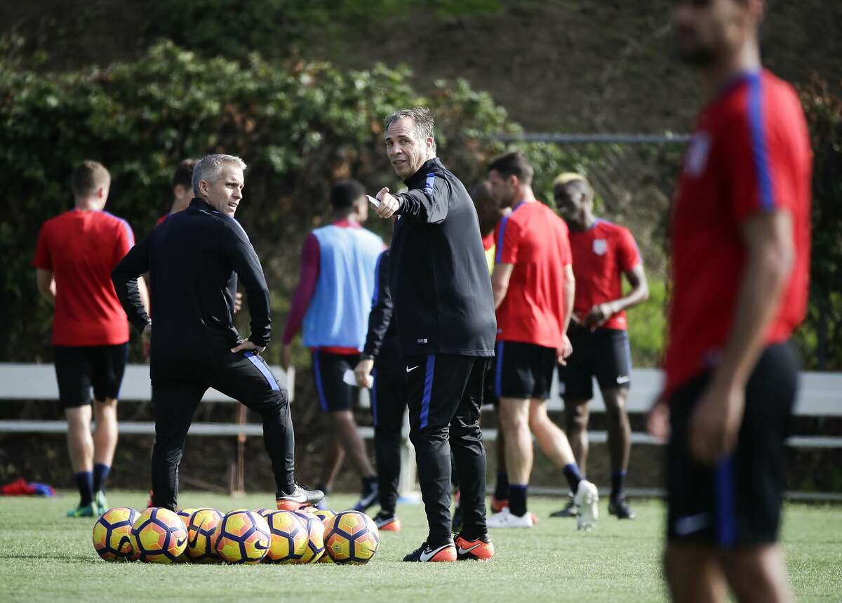 U.S. men's national soccer team coach Bruce Arena, center, gestures during a practice session Wednesday, Jan. 11, 2017, in Carson, Calif. (AP Photo/Jae C. Hong)