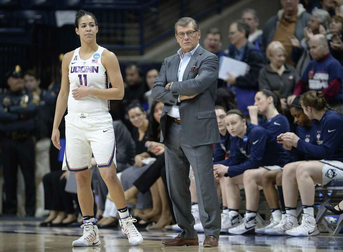 UConn’s Kia Nurse, left, and coach Geno Auriemma watch the action during Saturday’s NCAA tournament win over Albany.