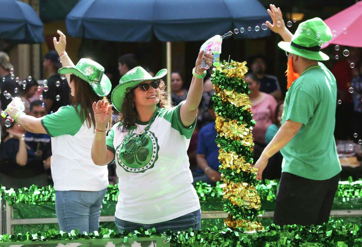 Bubbles aboard a float contribute to the festivities as St. Patrick's Day is celebrated on the Riverwalk with both the river and the beer dyed green for the occasion on March 18, 2017.