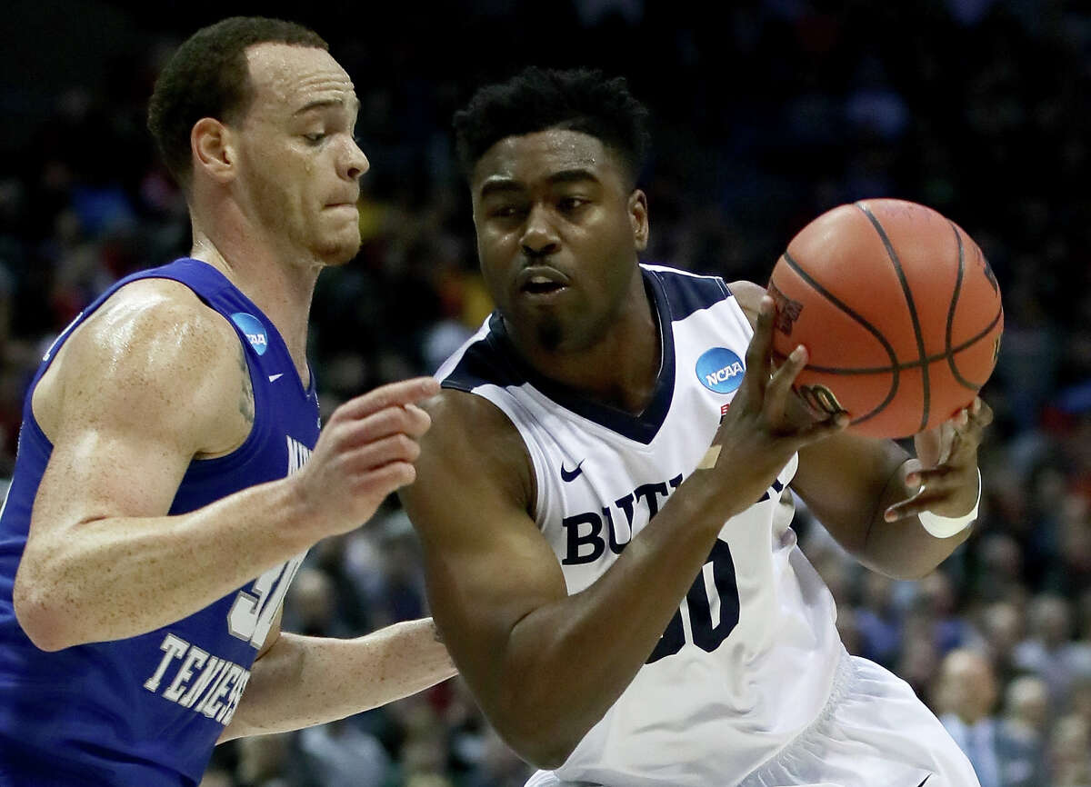 Kelan Martin, right, scored 19 points to lead Butler past Middle Tennessee State on Saturday night to earn the Bulldogs their first Sweet 16 berth since 2011.﻿