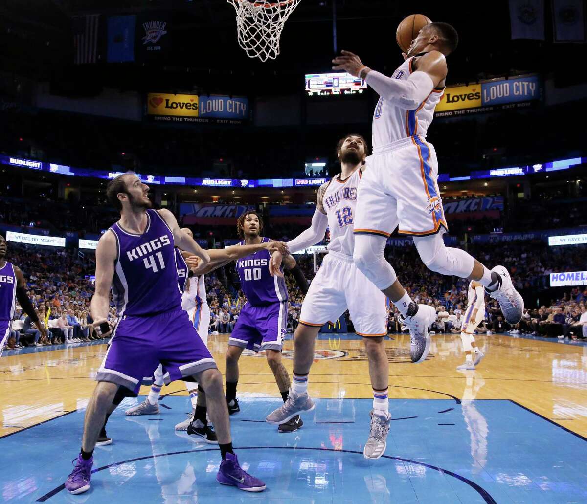 Oklahoma City guard Russell Westbrook, right, had 28 points, eight rebounds and 10 assists to help lead the Thunder to their fifth straight victory.