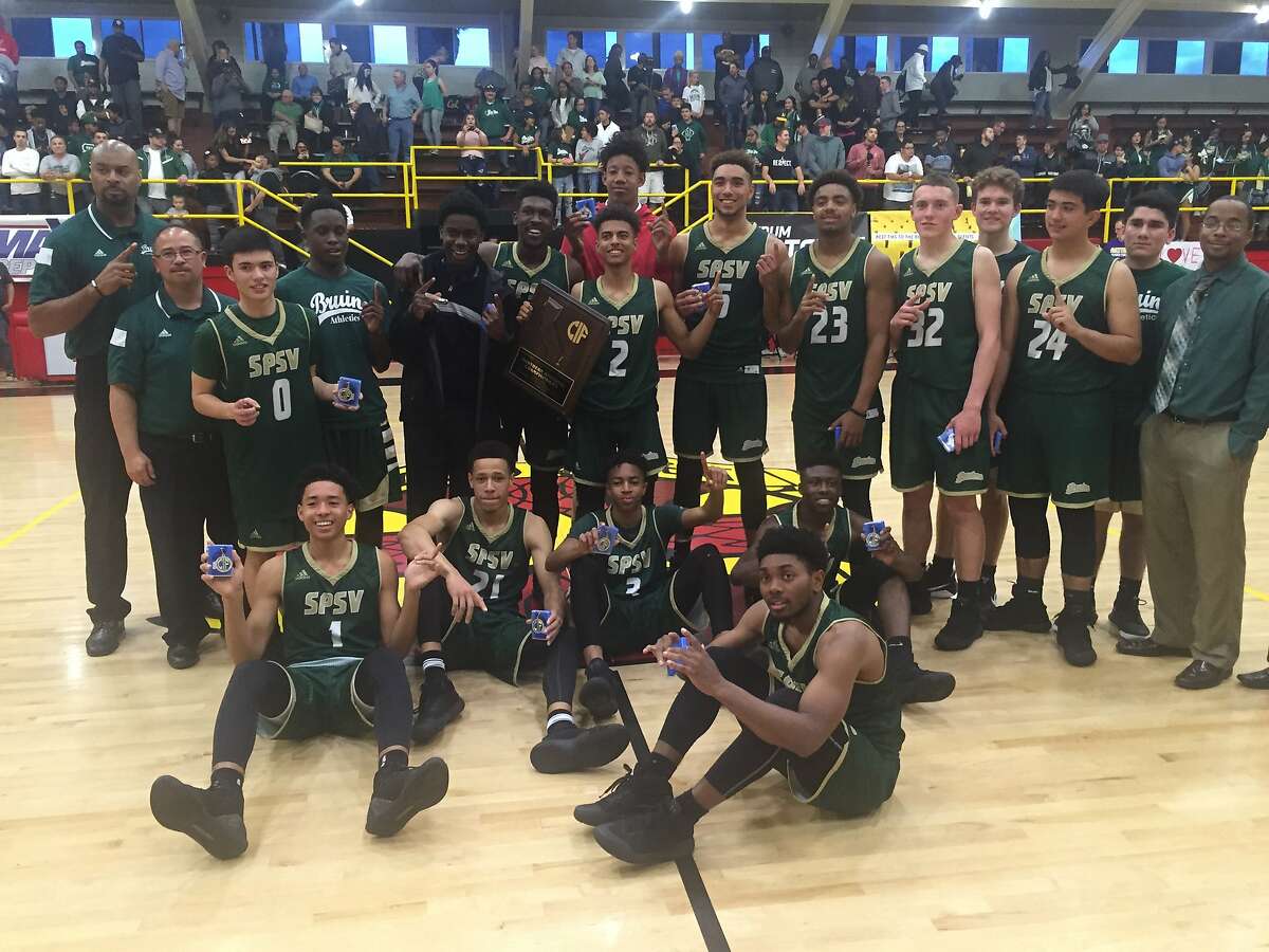 St. Patrick-St. Vincent-Vallejo players and coaches pose with their medals after winning the Northern California Division 4 title on Saturday night. The Bruins beat Palma-Salinas, 73-48.