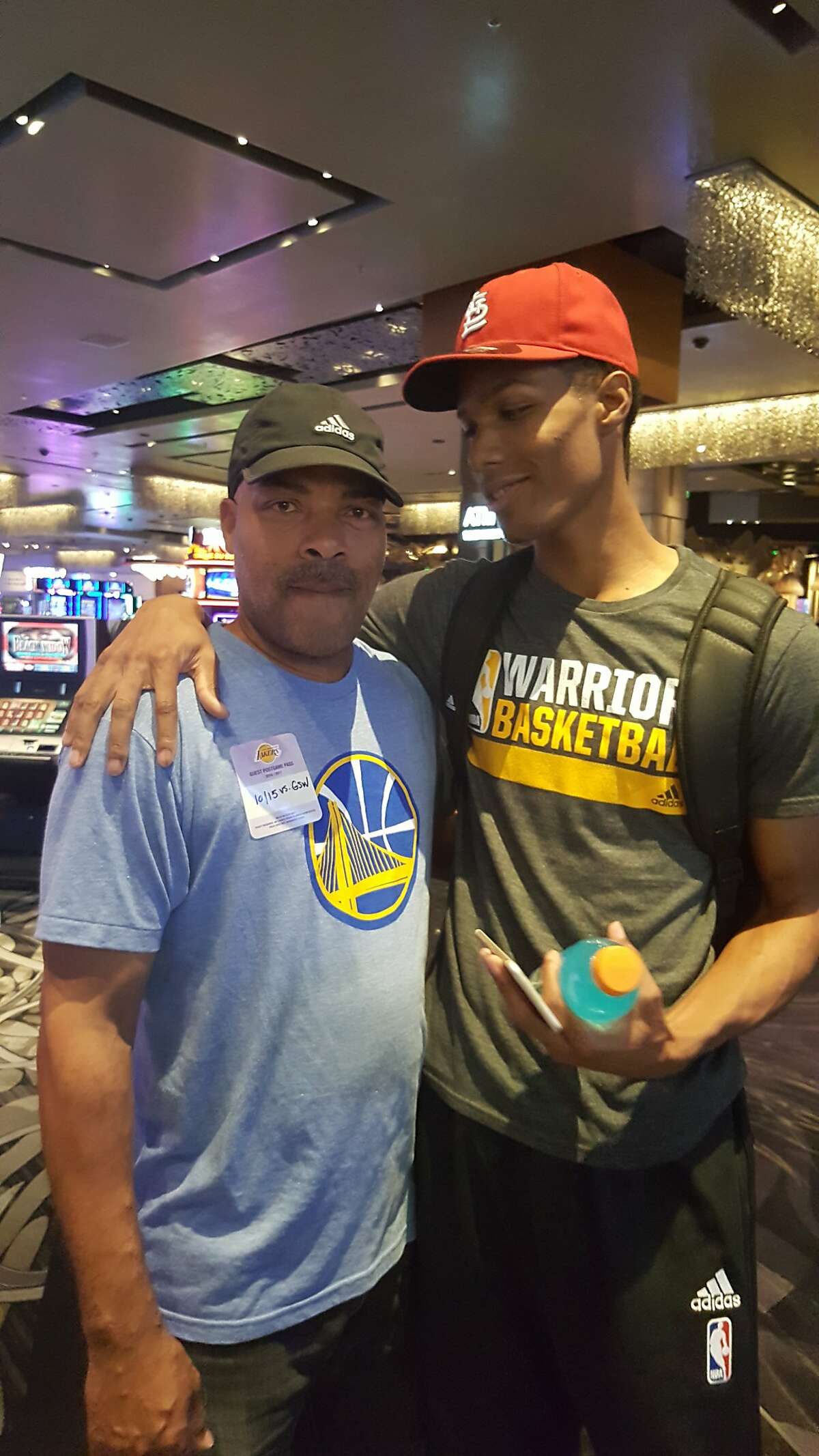 Rookie Patrick McCaw poses with his father, Jeff, before a Warriors-Lakers preseason game in Las Vegas in October.