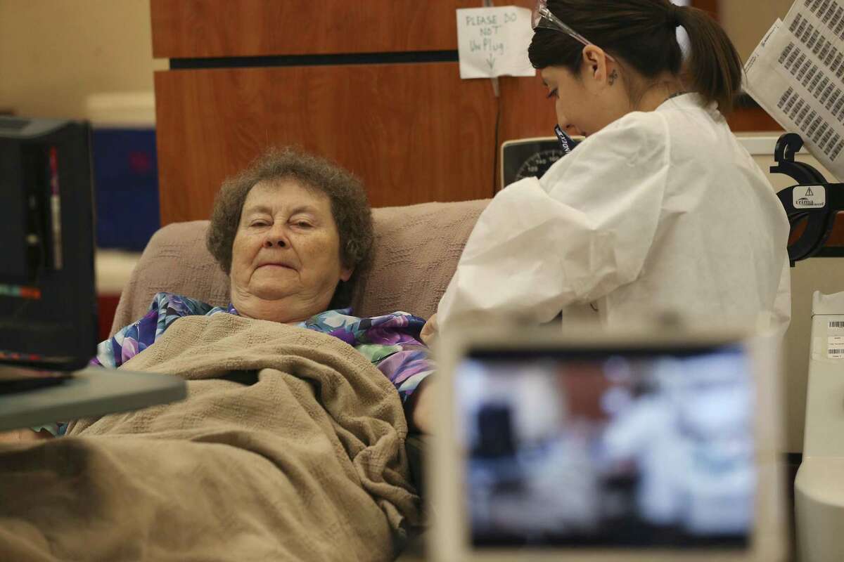 Sister Anna Marie Vrazel, a nun with the Sisters of Divine Providence, donates blood at the South Texas Blood & Tissue Center, Monday, Feb. 20, 2017. Inspired by her father, Vrazel has donated blood since 1969. Helping her is Krystal Garza. Vrazel is a member of the 40 gallon club and with her latest donation made it to 41gallons.