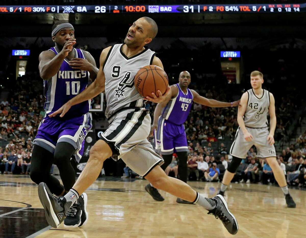 San Antonio Spurs' Tony Parker drives around Sacramento Kings' Ty Lawson during first half action Sunday March 19, 2017 at the AT&T Center. Click ahead to see what you don't know about Tony Parker.