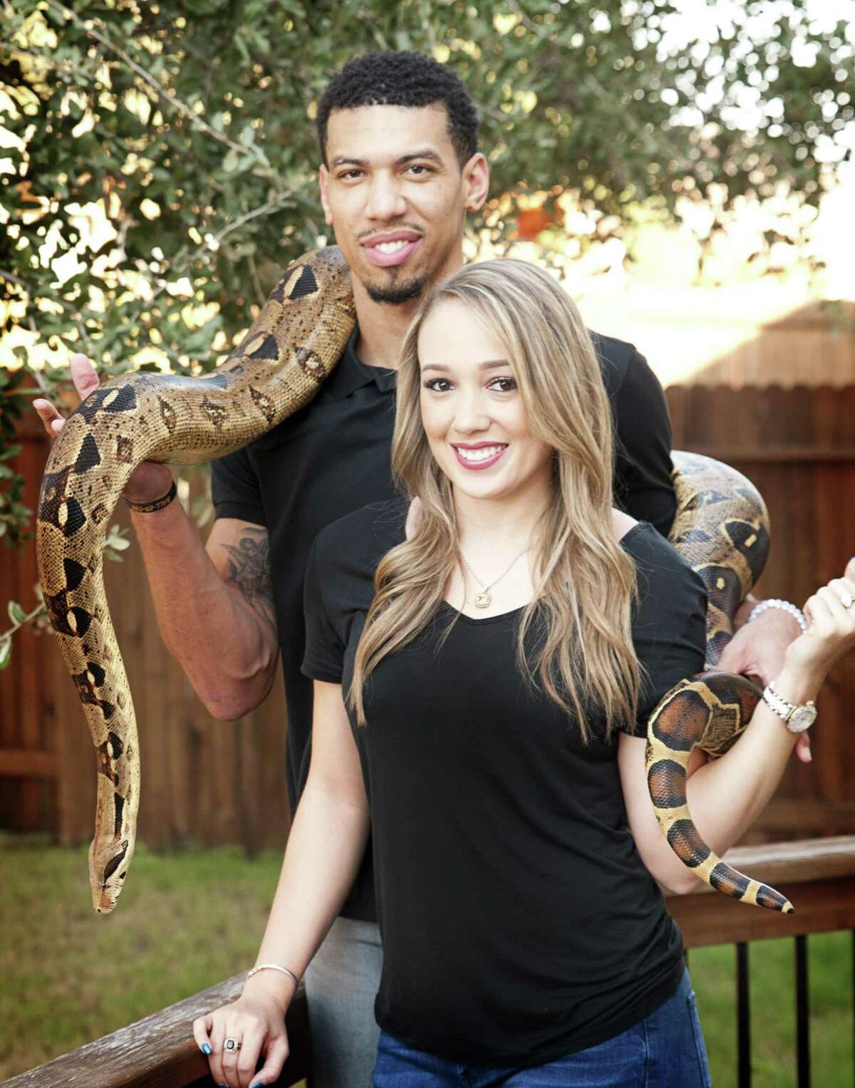 Spurs’ Danny Green and his girlfriend show off his pet python.