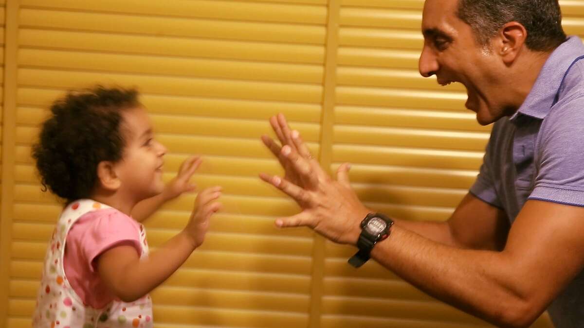 Bassem Youssef and daughter Nadia at home in Cairo, Egypt. Credit: Sarkasmos Productions LLC / Tickling Giants