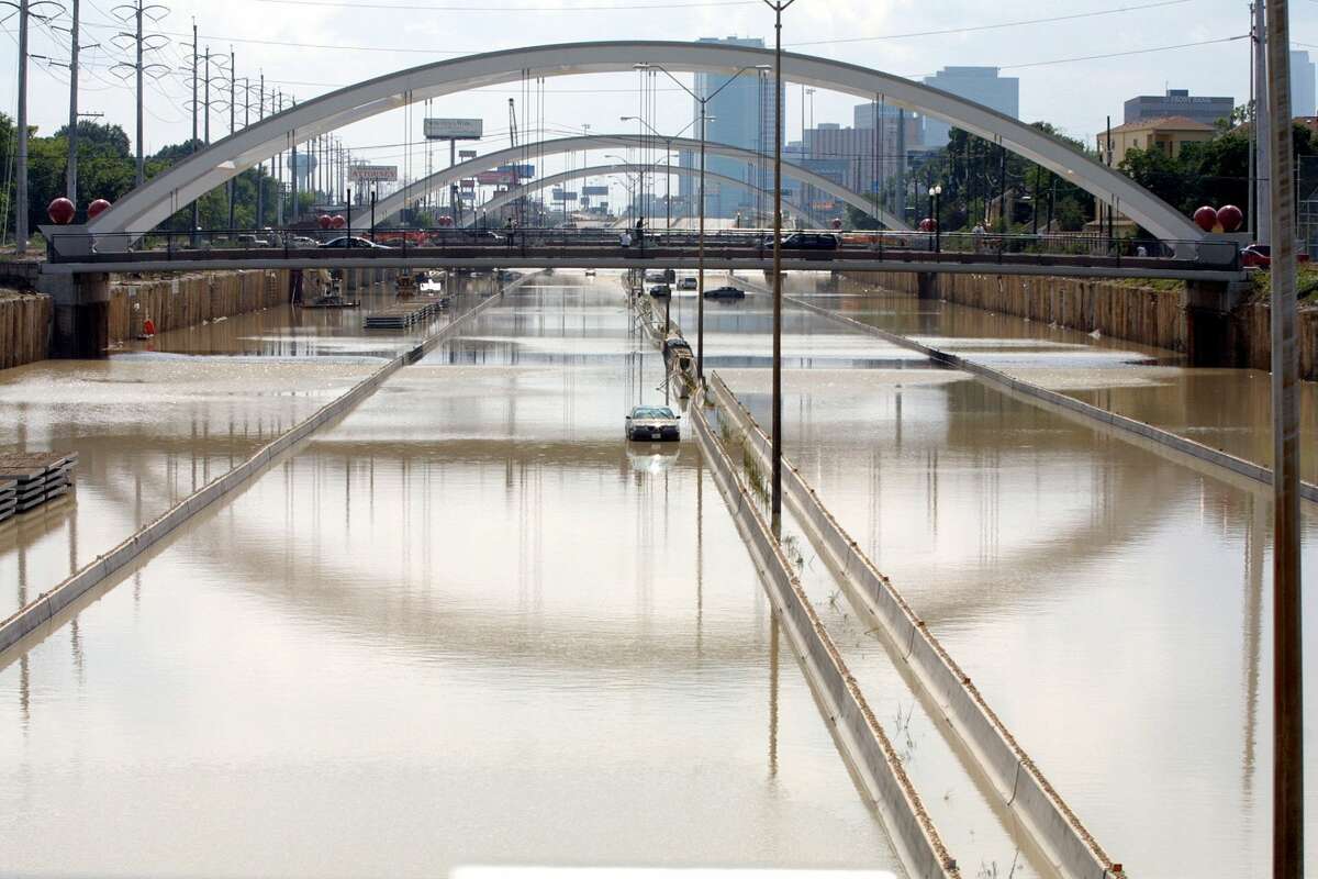 HOUSTON, UNITED STATES: US Highway 59 is still impassable 10 June 2001 in Houston, Texas, due to rain from tropical storm Allison. Thousands of people in Texas and Louisiana were temporarily homeless after being forced to flee flooding caused by four days of torrential rains. The American Red Cross blamed at least seven deaths on the violent weather, the aftermath of tropical storm Allison. AFP PHOTO/James NIELSEN (Photo credit should read JAMES NIELSEN/AFP/Getty Images)
