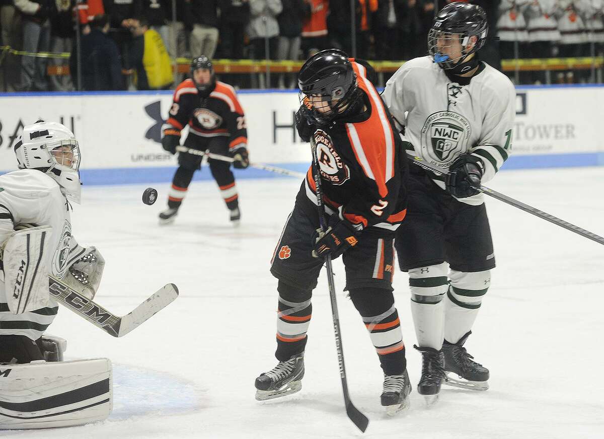 Ridgefield wins first Division I boys hockey title