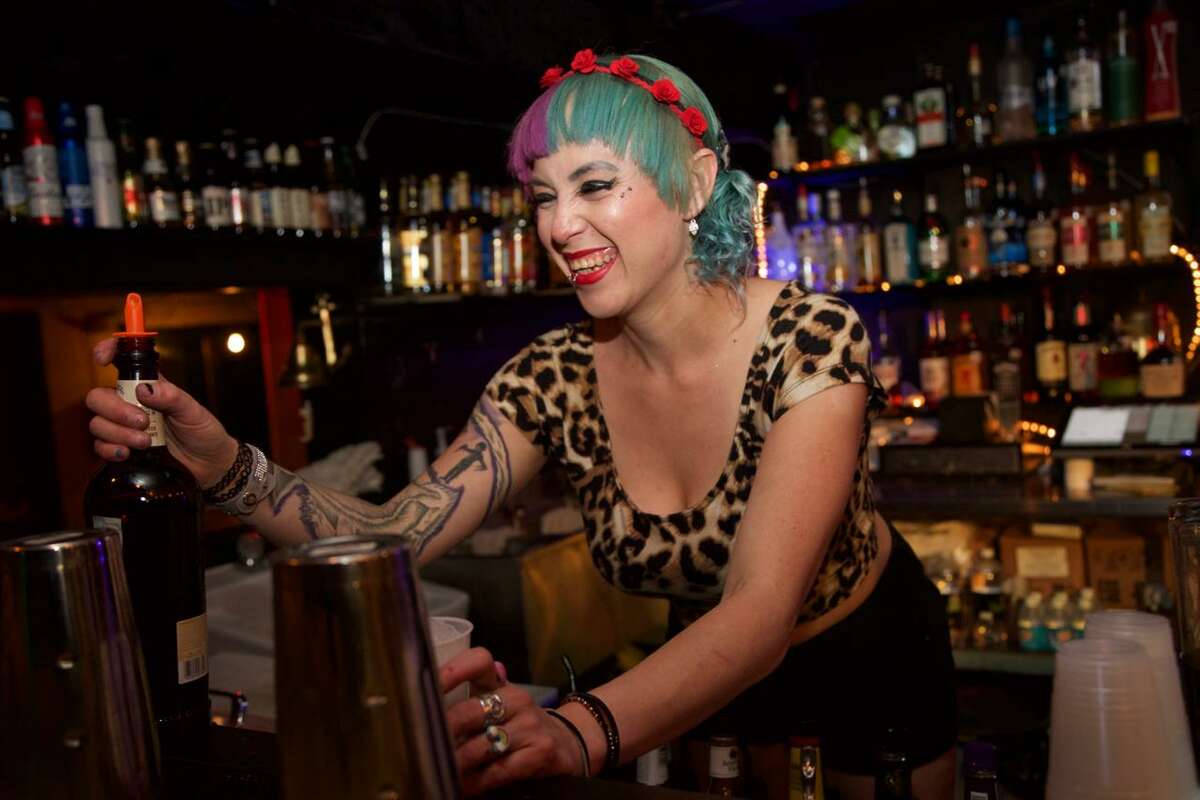Andrea Jamison serves a drink at Gold Bar. Photo By: Xelina Flores