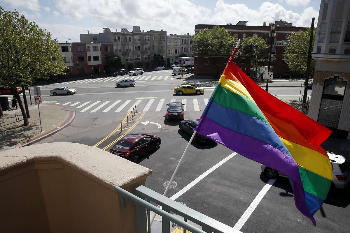 A rainbow flag flies from restored Richardson Hall where Laguna, Hermann and Market streets converge at new LGBT-friendly affordable senior housing in S.F.