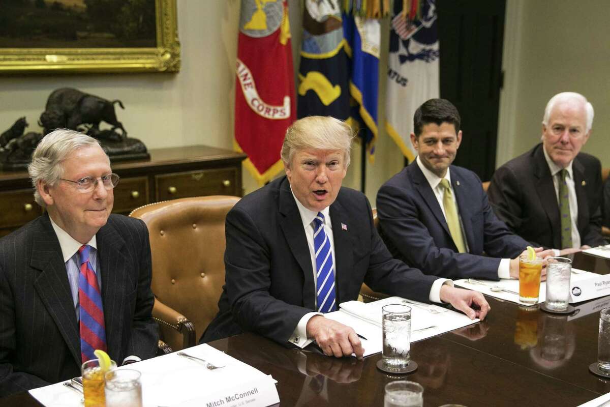 From left: Senate Majority Leader Mitch McConnell (R-Ky.), President Donald Trump, House Speaker Paul Ryan (R-Wis.) and Senate Majority Whip John Cornyn (R-Texas) during a lunch meeting in the Roosevelt Room of the White House on March 1. If the GOP health care plan fails, Trump may abandon Congress.