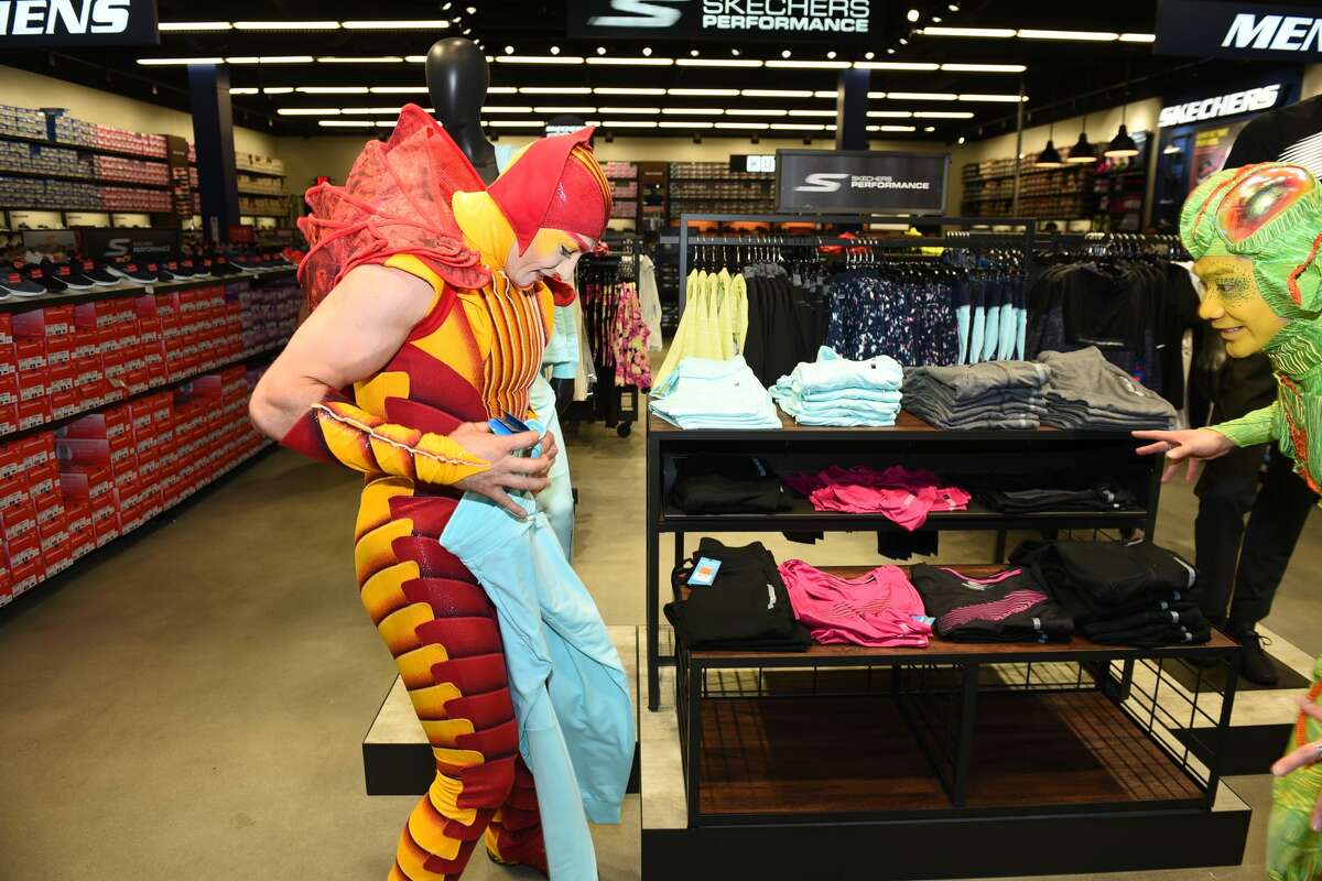 Characters from Cirque Du Soleil OVO interact with shoppers at the Outlet Shoppes of Laredo on Tuesday, March 21, 2017.