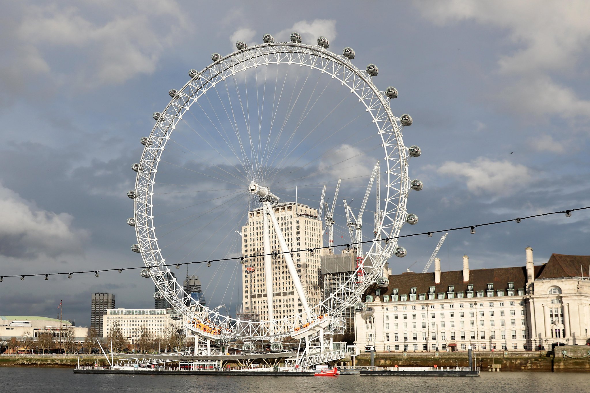 Hundreds stuck in mid-air on London Eye, London