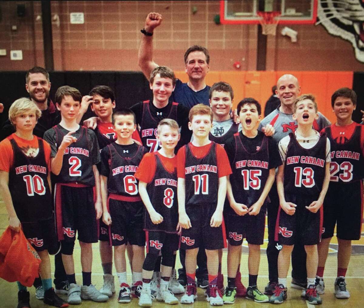 The New Canaan sixth grade Black team poses after winning the FCBL A Division championship.