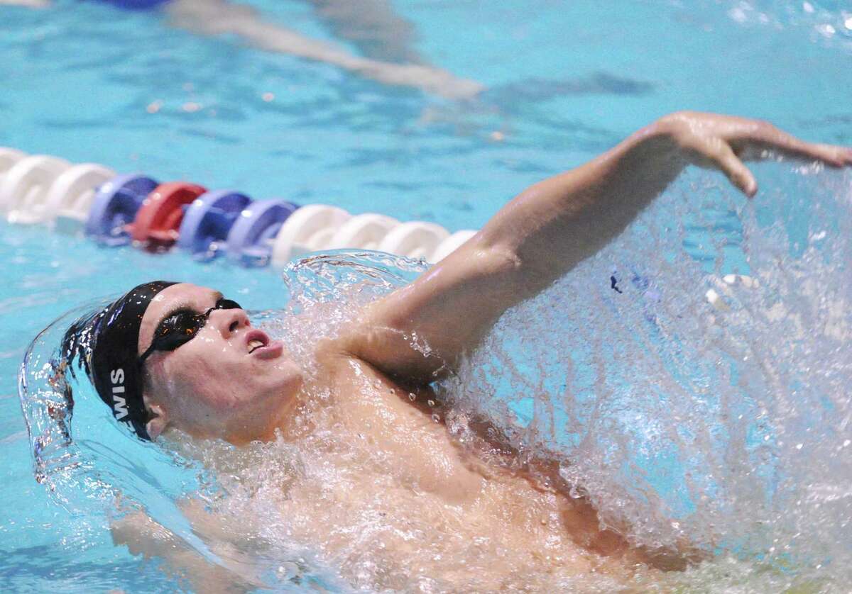 Aedan Lewis of Greenwich swims in the 200-yard medley relay event during the State Open Saturday at Yale University’s Kiphuth Pool in New Haven.