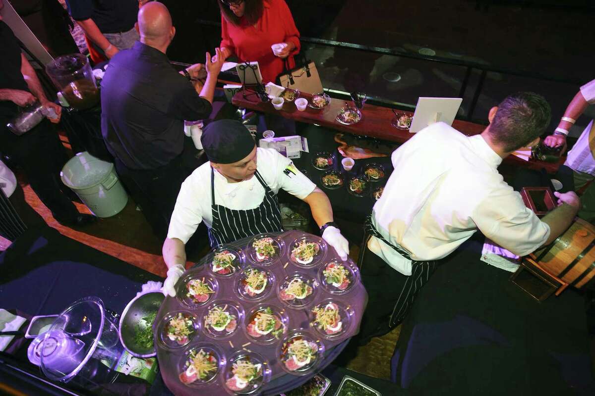 Last year, staff from 18 Oaks served gourmet fare at the 2017 Express-News Top 100 Dining and Drinks Tasting Event.