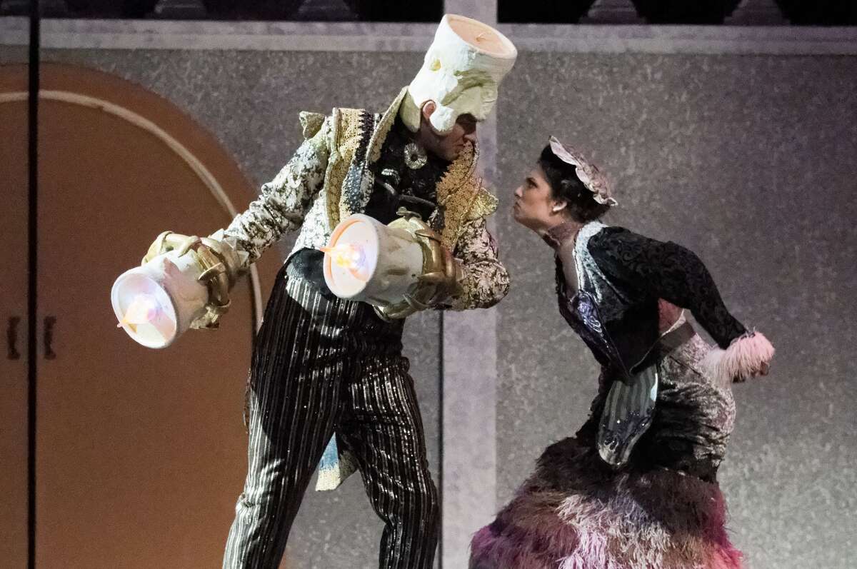 STEVEN SIMPKINS | for the Daily News Stephen Fort, left, and Claire Francis rehearse a scene from the Center Stage Theatre's production of "Beauty and the Beast" Wednesday evening at the Midland Center for the Arts. The musical opens March 25 at 7:30 p.m. and has five more shows running March 26 at 3 p.m., March 30-April 1 at 7:30 p.m., April 2 at 3:00 p.m.