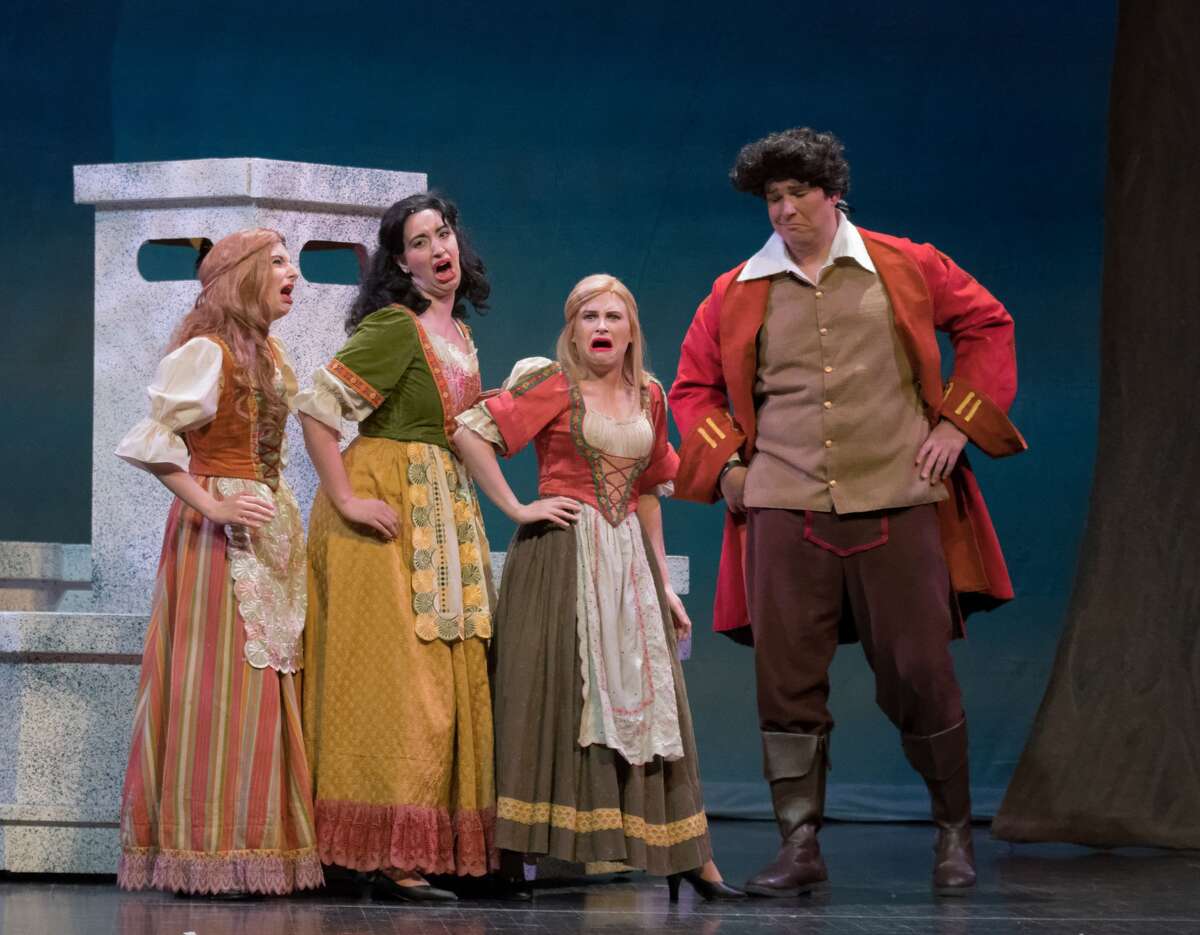 STEVEN SIMPKINS | for the Daily News From left: Brittany Ann Nicol, Mackenzie Hopkins, Jaeleen Davis and Patrick Schefsky rehearse a scene from the Center Stage Theatre's production of "Beauty and the Beast" Wednesday evening at the Midland Center for the Arts. The musical opens March 25 at 7:30 p.m. and has five more shows running March 26 at 3 p.m., March 30-April 1 at 7:30 p.m., April 2 at 3:00 p.m.