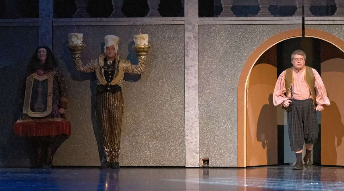 STEVEN SIMPKINS | for the Daily News From left: Kyle Sanborn, Stephen Fort and Dale Bills rehearse a scene from the Center Stage Theatre's production of "Beauty and the Beast" Wednesday evening at the Midland Center for the Arts. The musical opens March 25 at 7:30 p.m. and has five more shows running March 26 at 3 p.m., March 30-April 1 at 7:30 p.m., April 2 at 3:00 p.m.
