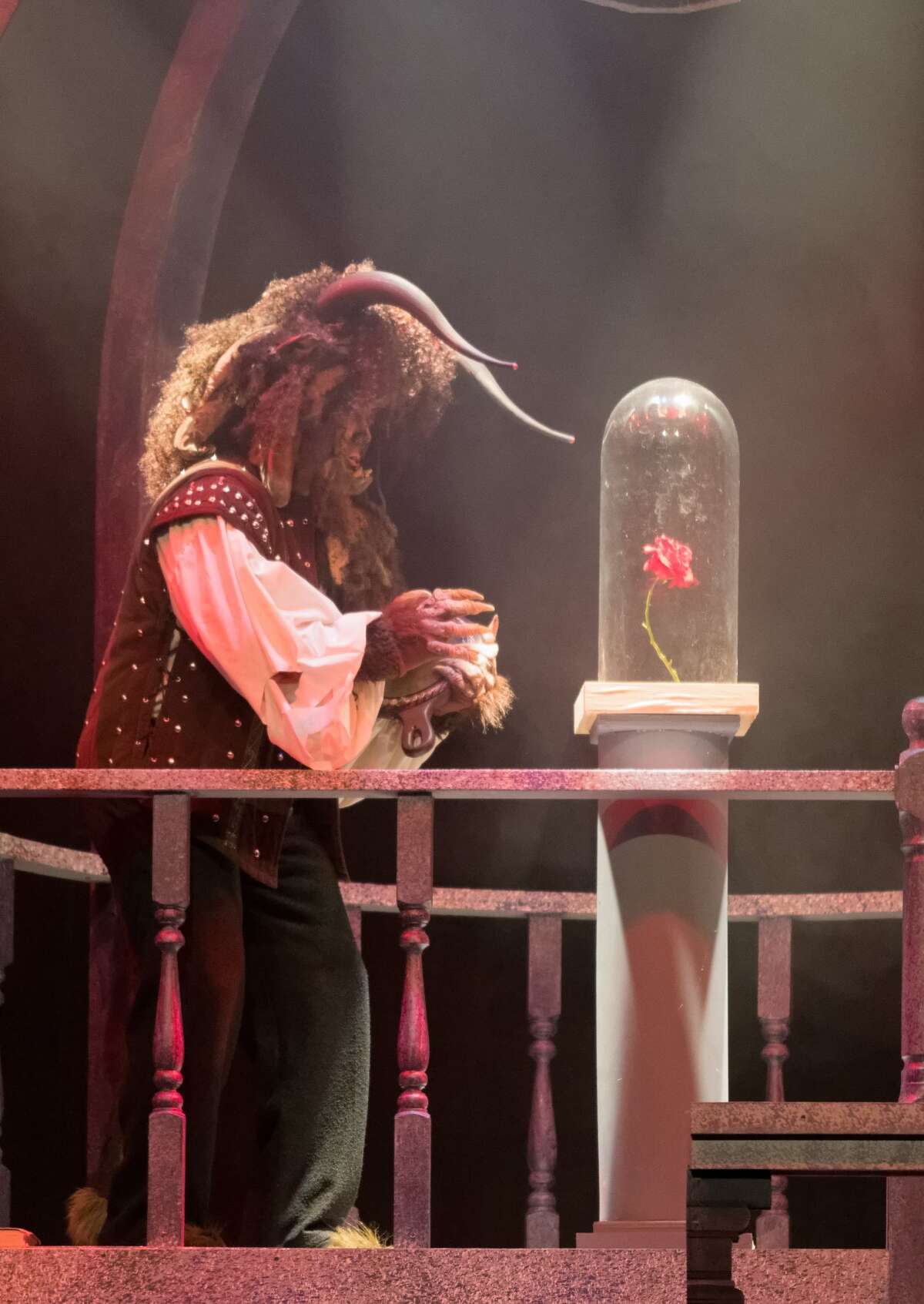 STEVEN SIMPKINS | for the Daily News True Rogers rehearses a scene from the Center Stage Theatre's production of "Beauty and the Beast" Wednesday evening at the Midland Center for the Arts. The musical opens March 25 at 7:30 p.m. and has five more shows running March 26 at 3 p.m., March 30-April 1 at 7:30 p.m., April 2 at 3:00 p.m.