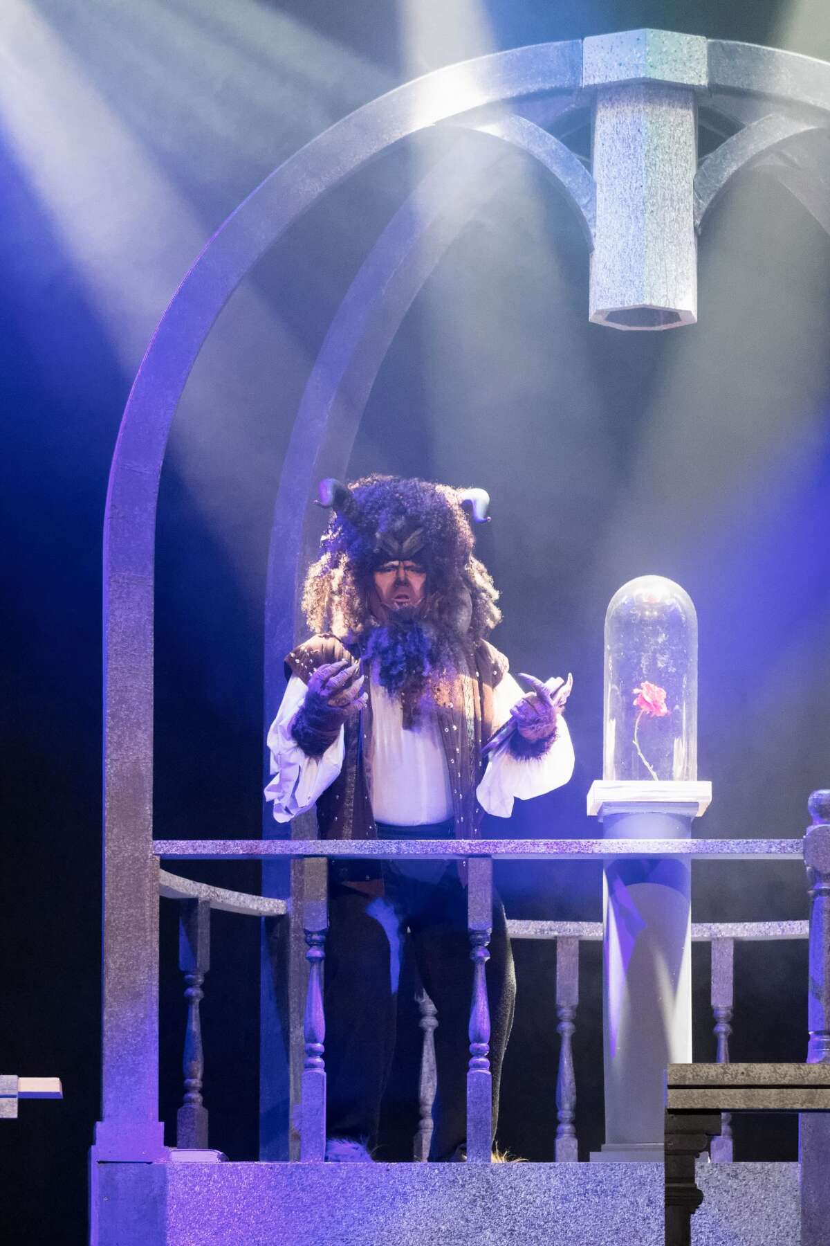 STEVEN SIMPKINS | for the Daily News True Rogers rehearses a scene from the Center Stage Theatre's production of "Beauty and the Beast" Wednesday evening at the Midland Center for the Arts. The musical opens March 25 at 7:30 p.m. and has five more shows running March 26 at 3 p.m., March 30-April 1 at 7:30 p.m., April 2 at 3:00 p.m.