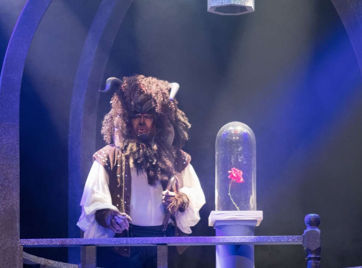 STEVEN SIMPKINS | for the Daily News True Rogers rehearses a scene from the Center Stage Theatre's production of "Beauty and the Beast" Wednesday evening at the Midland Center for the Arts. The musical opens March 25 at 7:30 p.m. and has five more shows running March 26 at 3 p.m., March 30-April 1 at 7:30 p.m., April 2 at 3:00 p.m.